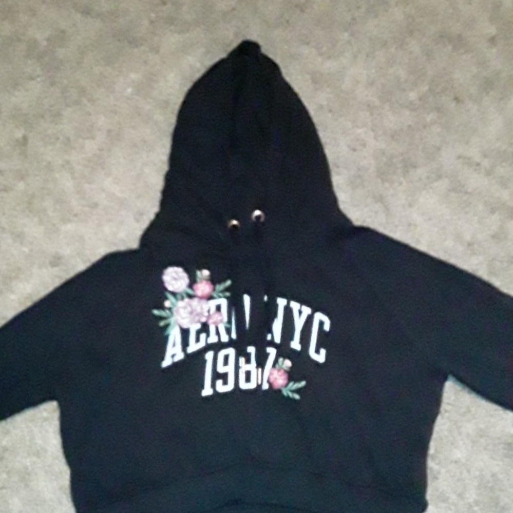 Black hoodie with roses on it.(Aero NYC 1987)